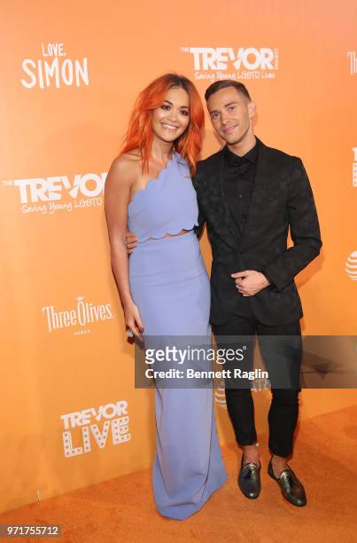 Recording artist Rita Ora and Olympian Adam Rippon attend the 2018 TrevorLIVE Gala at Cipriani Wall Street on June 11, 2018 in New York City.