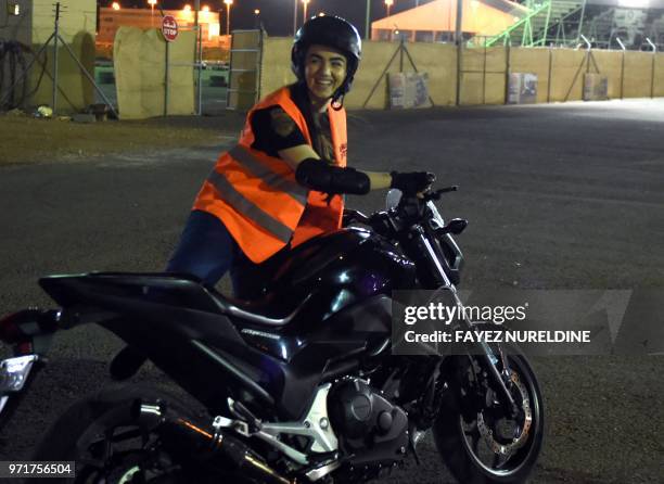 Picture taken June 3, 2018 shows Saudi-born Jordanian Leen Teenawi preparing for a training session at the Bikers Skills Institute, a motorcycle...