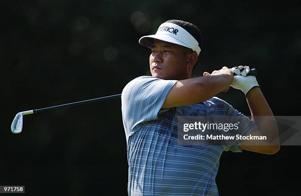 Choi of South Korea hits off the sixth tee during the first round July 4, 2002 of the Advil Western Open at Cog Hill Golf and Country Club in Lemont,...