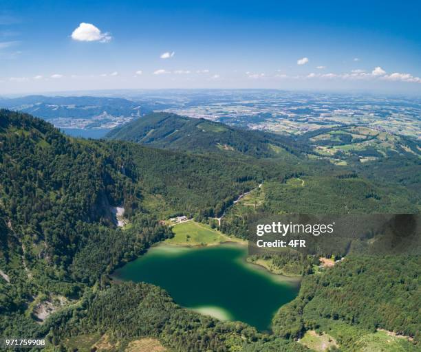 panoramic view over the beautiful lake laudachsee with lake traunsee in back, austrian alps, austria - vocklabruck stock pictures, royalty-free photos & images