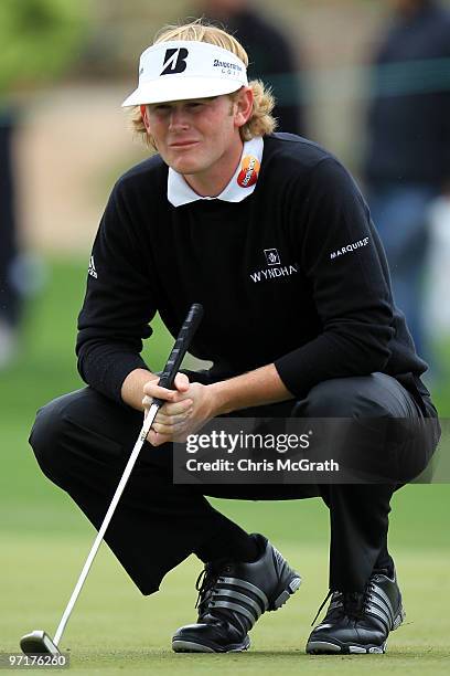 Brandt Snedeker lines up his putt on the second green during the final round of the Waste Management Phoenix Open at TPC Scottsdale on February 28,...
