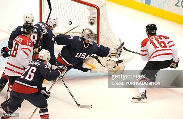 Canadian forward Jonathan Toews scores Canada's first goal during the Men's Gold Medal Hockey match between USA and Canada at the Canada Hockey Place...