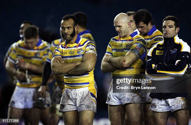 Dejected Leeds Team look on as Melbourne Storm receive the World Club Challenge Cup after winning the match between Leeds Rhinos and Melbourne Storm...