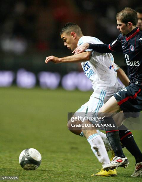 Marseille's forward Hatem Ben Arfa vies with a Paris opponent during the French L1 football match Paris vs Marseille, on February 28, 2010. AFP PHOTO...