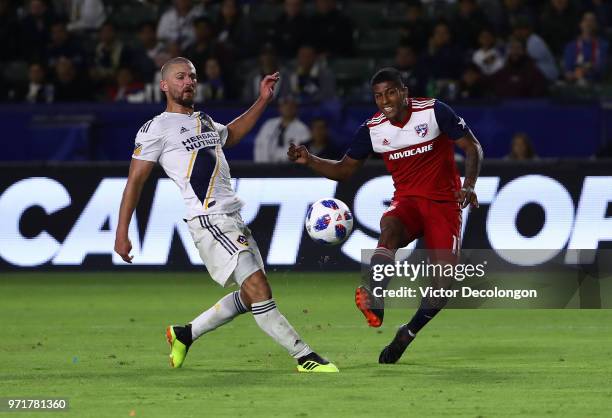 Perry Kitchen of Los Angeles Galaxy can't defend a shot by Jesse Gonzalez of FC Dallas in the second half during the MLS match at StubHub Center on...