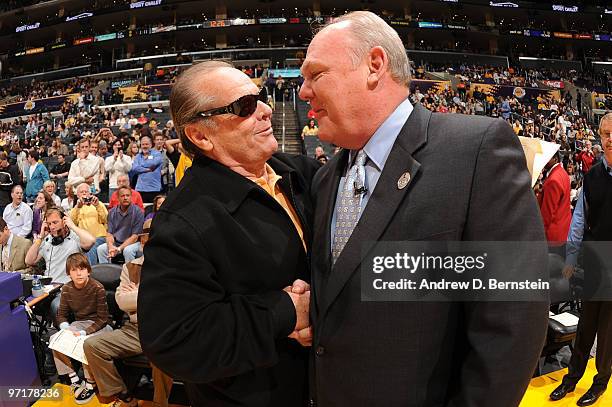 Actor Jack Nicholson greets Head Coach George Karl of the Denver Nuggets before a game against the Los Angeles Lakers at Staples Center on February...