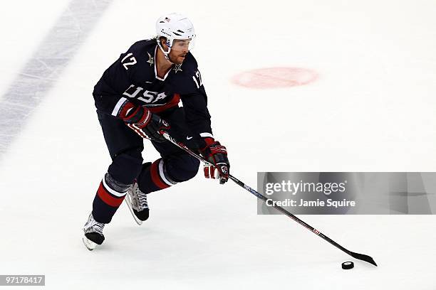 Ryan Malone of the United States skates with the puck during the ice hockey men's gold medal game between USA and Canada on day 17 of the Vancouver...