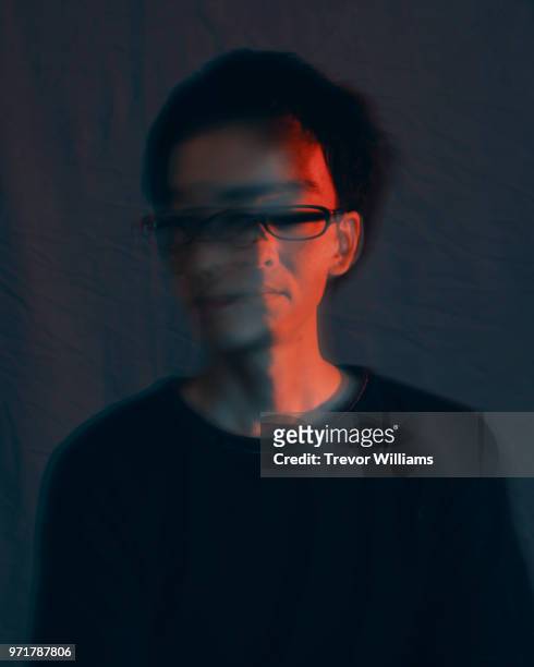 Double exposure portrait of a mid-adult man