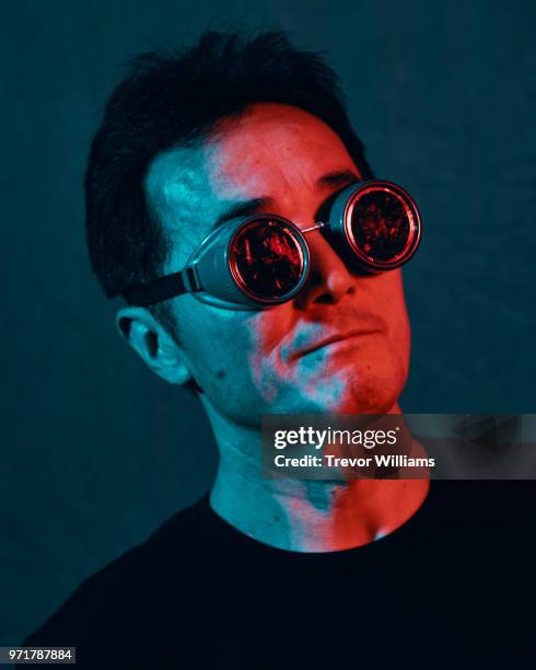 mature man wearing goggles with a confident expression - mental toughness stock pictures, royalty-free photos & images