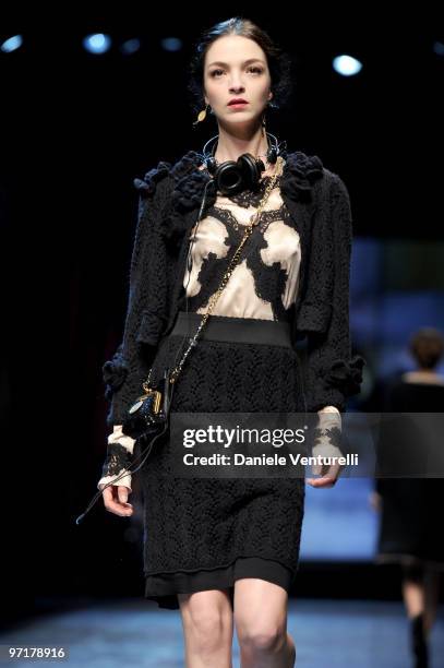 Model Mariacarla Boscono walks the runway during the Dolce & Gabbana Milan Fashion Week Autumn/Winter 2010 show on February 28, 2010 in Milan, Italy.