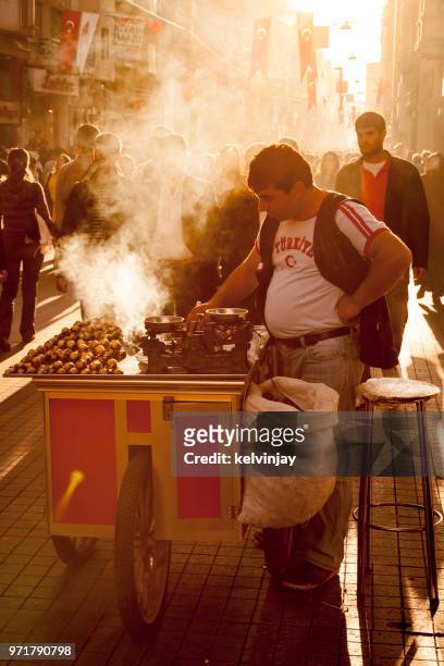 street food vendor on istiklal avenue in the centre of istanbul, turkey - kelvinjay stock pictures, royalty-free photos & images