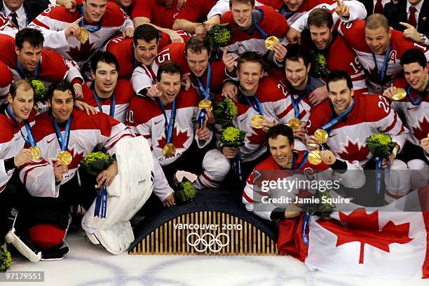 Team Canada celebrates with their gold medals after winning the ice hockey men's gold medal game between USA and Canada on day 17 of the Vancouver...