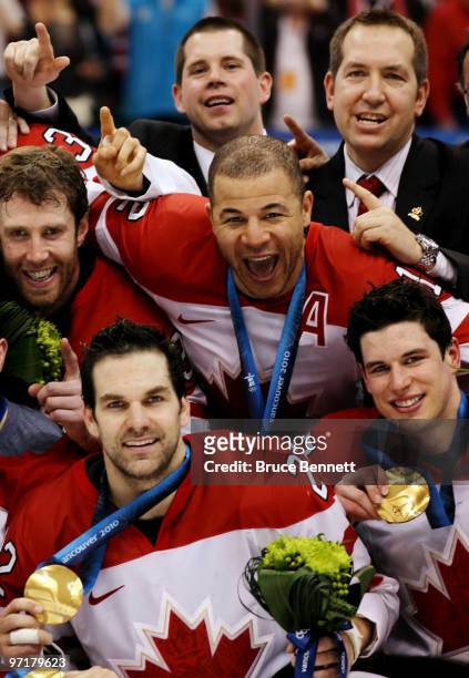 Jarome Iginla of Canada celebrates with his team after winning the gold medal after the ice hockey men's gold medal game between USA and Canada on...