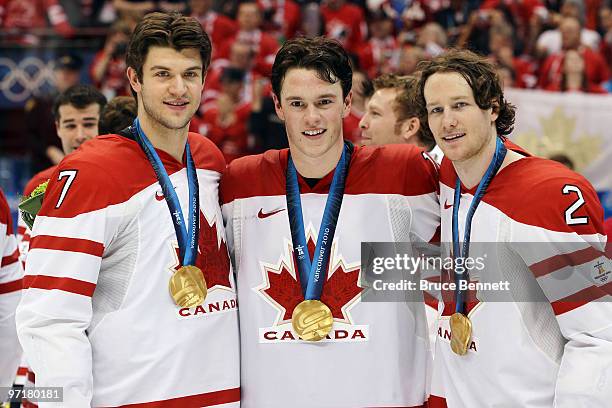 Brent Seabrook, Jonathan Toews and Duncan Keith of Canada during the ice hockey men's gold medal game between USA and Canada on day 17 of the...