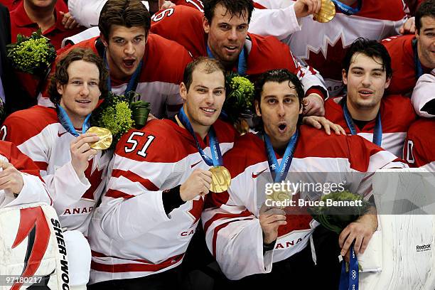 Team Canada celebrates with the gold medal after winning the ice hockey men's gold medal game between USA and Canada on day 17 of the Vancouver 2010...