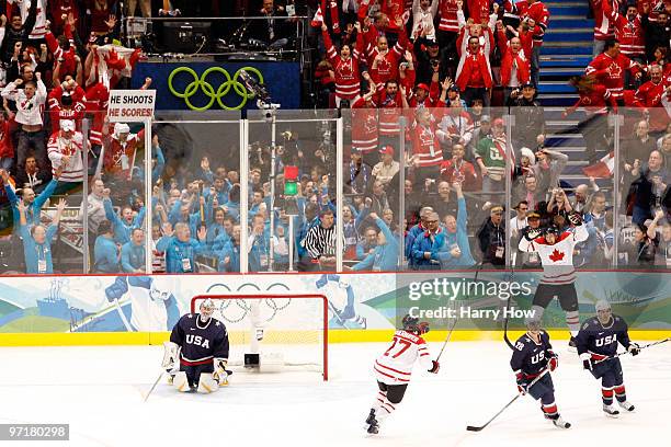 Sidney Crosby of Canada celebrates after scoring the game winning goal against Ryan Miller of the United States in overtime of the ice hockey men's...