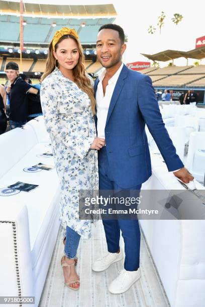 Chrissy Teigen and John Legend attend the Fourth Annual Los Angeles Dodgers Foundation Blue Diamond Gala at Dodger Stadium on June 11, 2018 in Los...