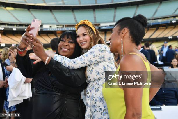 Loni Love, Chrissy Teigen, Dawnn Lewis attend the Fourth Annual Los Angeles Dodgers Foundation Blue Diamond Gala at Dodger Stadium on June 11, 2018...