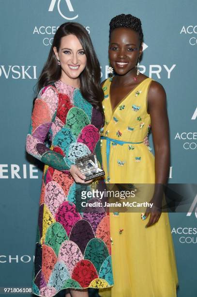 Micaela Erlanger and Lupita Nyong'o pose backstage at the 22nd Annual Accessories Council ACE Awards at Cipriani 42nd Street on June 11, 2018 in New...
