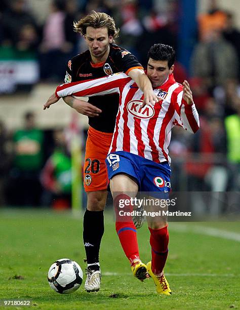 Jose Antonio Reyes of Atletico Madrid fights for the ball with Alexis Ruano of Valencia during the La Liga match between Atletico Madrid and Valencia...