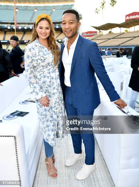 John Legend and Chrissy Teigen attends the Fourth Annual Los Angeles Dodgers Foundation Blue Diamond Gala at Dodger Stadium on June 11, 2018 in Los...