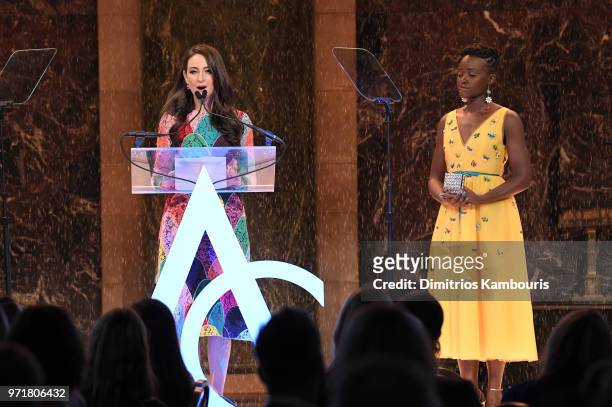 Micaela Erlanger accepts an award onstgae from Lupita Nyong'o during the 22nd Annual Accessories Council ACE Awards at Cipriani 42nd Street on June...