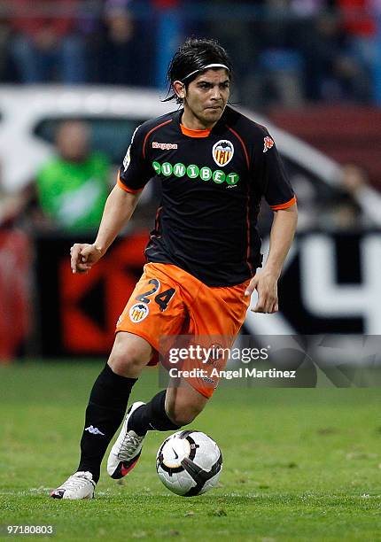Ever Banega of Valencia in action during the La Liga match between Atletico Madrid and Valencia at Vicente Calderon Stadium on February 28, 2010 in...