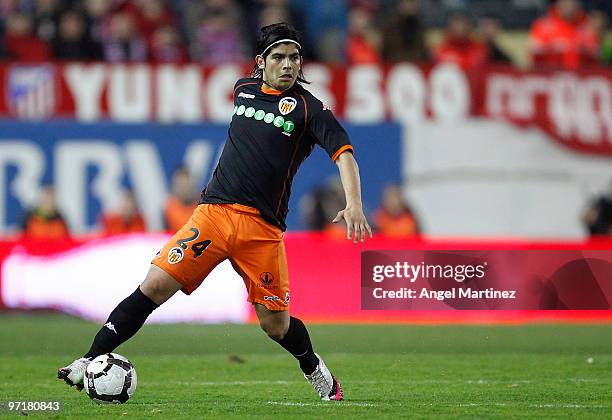 Ever Banega of Valencia in action during the La Liga match between Atletico Madrid and Valencia at Vicente Calderon Stadium on February 28, 2010 in...