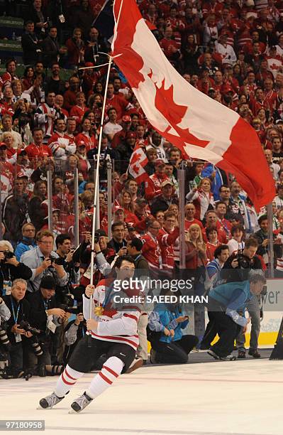Canada's Drew Doughty reacts after Canada defeating the US in the men's gold medal Ice Hockey match at Canada Hockey Place during the Vancouver...