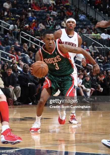 Brandon Jennings of the Milwaukee Bucks drives to the basket against the Atlanta Hawks on February 28, 2010 at Philips Arena in Atlanta, Georgia....