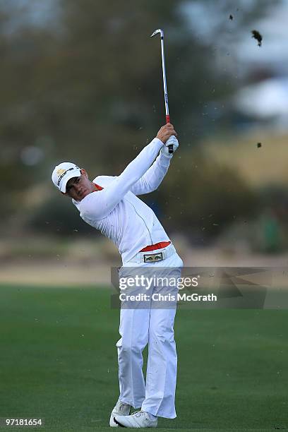 Camilo Villegas of Columbia plays his second shot on the 14th hole during the final round of the Waste Management Phoenix Open at TPC Scottsdale on...