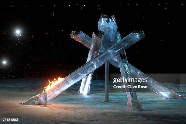 Former speed skater Catriona LeMay Doan lights the Olympic cauldron during the Closing Ceremony of the Vancouver 2010 Winter Olympics at BC Place on...