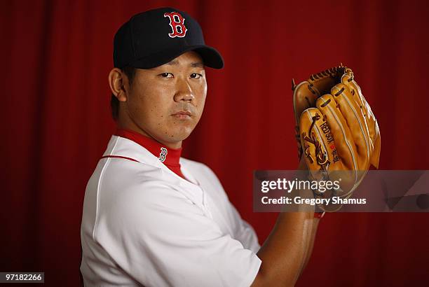 Daisuke Matsuzaka of the Boston Red Sox poses during photo day at the Boston Red Sox Spring Training practice facility on February 28, 2010 in Ft....