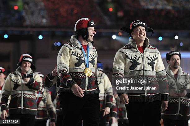 Gold medalist curling skip Kevin Martin of Canada walks with his team during the Closing Ceremony of the Vancouver 2010 Winter Olympics at BC Place...