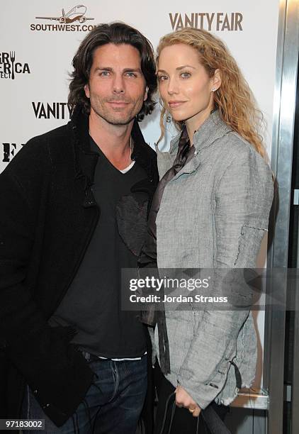 Actor Greg Lauren and actress Elizabeth Berkley arrive at the FEED Foundation/Hungry In America project benefit hosted by Vanity Fair held at Craft...