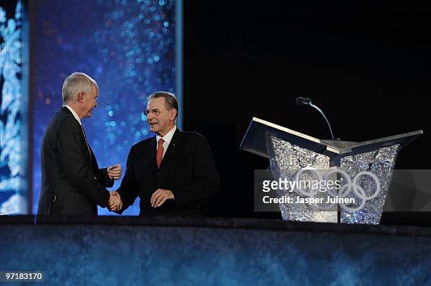 Vanoc CEO John Furlong shakes hands with IOC President Jacques Rogge during the Closing Ceremony of the Vancouver 2010 Winter Olympics at BC Place on...