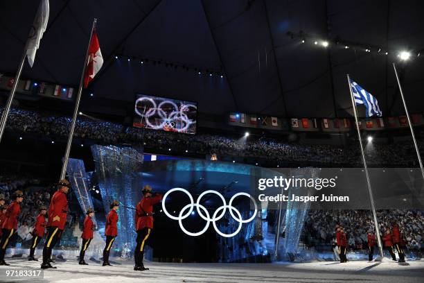 Royal Canadian Mounted Police raise the Greek flag during the Closing Ceremony of the Vancouver 2010 Winter Olympics at BC Place on February 28, 2010...