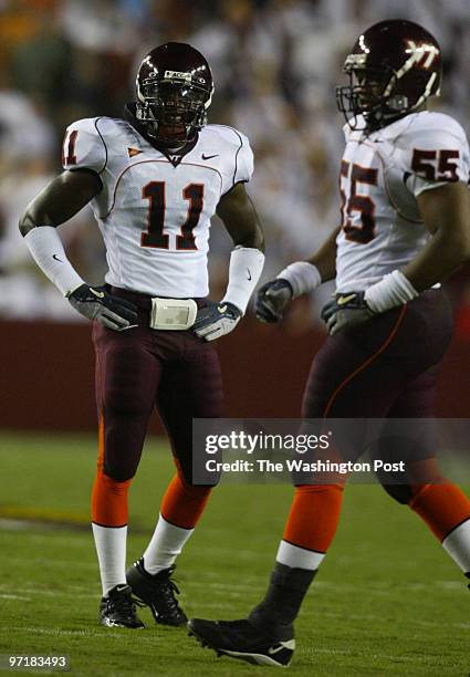 Neg#:158952 Photog:Preston Keres/TWP FedEx Field, Lancover, Md. Virginia Tech's Xavier Adibi waits for the play to be called while Darryl Tapp runs...