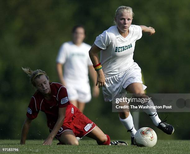 Neg#:144955 Photog:Preston Keres/TWP SoccerPlex, Germantown, Md. The Bethesda Dragon's Zoe Bouchelle leaves the Dallas Texans Red's Lauren Pope...