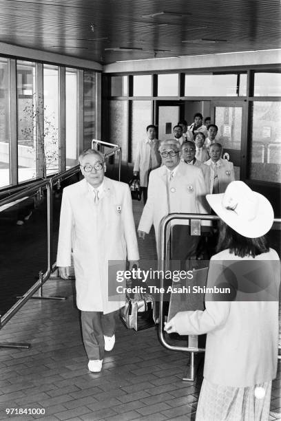 Japanese delegation is seen on arrival at Calgary Airport ahead of the Calgary Winter Olympics on February 8, 1988 in Calgary, Canada.