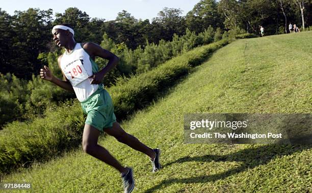 Sm_xc14 9_10_03 #_146747 Mark Gail_TWP Patuxent'sPaul Travers, first place winner in the cross country meet between Calvert, La Plata and Patuxent...