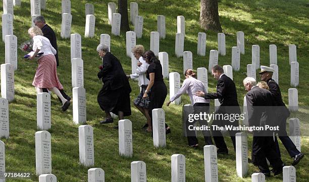 Sisters Karen Carlisle, Sandra Gonzales and lisa Carlise are in town to witness their father's memorial ceremony at Arlington National Cemetery....