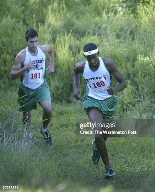 Sm_xc14 9_10_03 #_146747 Mark Gail_TWP Patuxent's Paul Travers and teammate Justin Smith finished one and two in the cross country meet between...