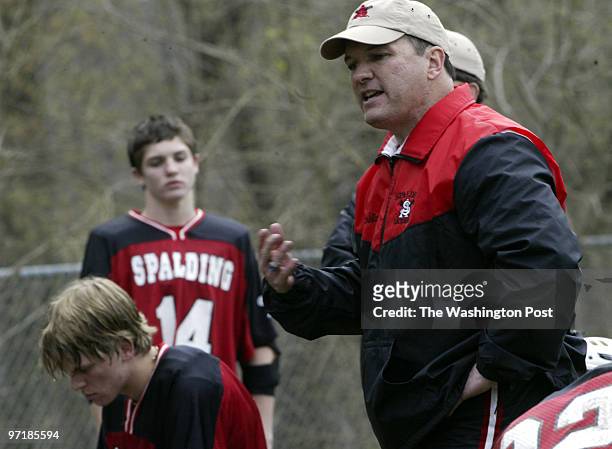 04/08/04 PHOTO BY : JOEL RICHARDSON 154175 SPALDING IN RED MOVES UP TO LEAGUE A AND LOSES TO ST. MARY'S ,,, SPALDING COACH HASWELL FRAKLIN TALKS W/...