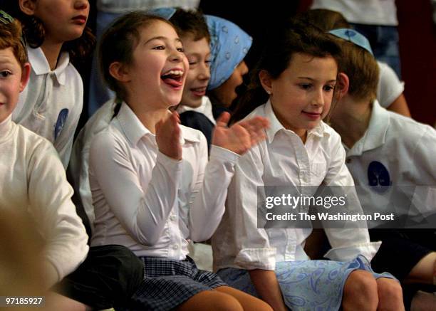 Year-old Mirit Shapiro gets excited as she recognized relatives in the audience just before the dedication of the Kay and Robert Schattner Center ....