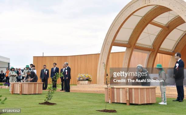 Emperor Akihito and Empress Michiko seed during the National Tree-Planting Festival on June 10, 2018 in Minamisoma, Fukushima, Japan. This 3-day trip...