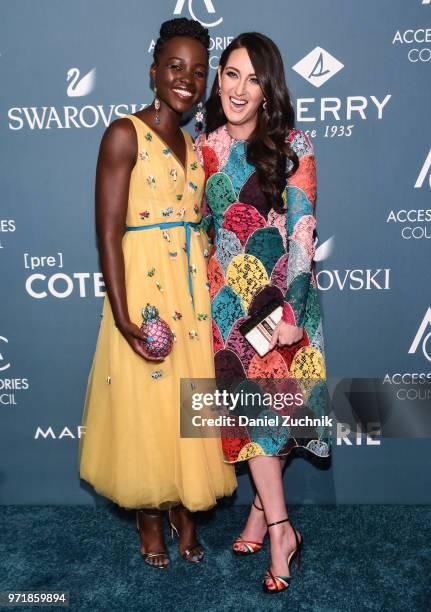 Lupita Nyong'o and Micaela Erlanger attend the 22nd Annual Accessories Council ACE Awards at Cipriani 42nd Street on June 11, 2018 in New York City.