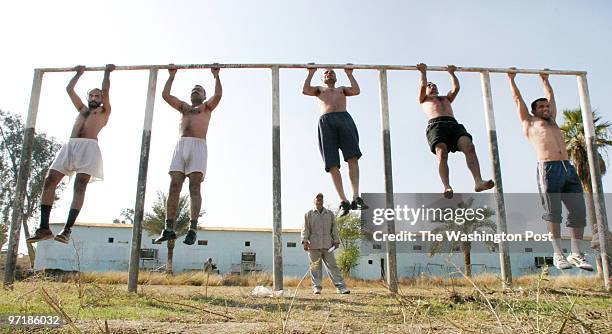 Iraq begins to train a new police force for it's beleagured country, with the help of coalition forces. Pictured, first lieutenant Jabbar Hamadi Abid...