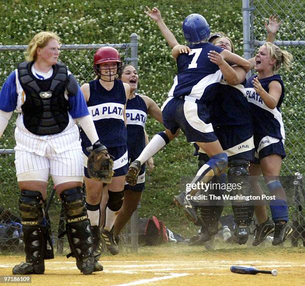 Sp-laplata Prince Frederick, Md. 05/19/05 #none Mark Gail/TWP La Plata's Lindsey Preuss jumps into teammates arms after scoring on a single by Jamie...