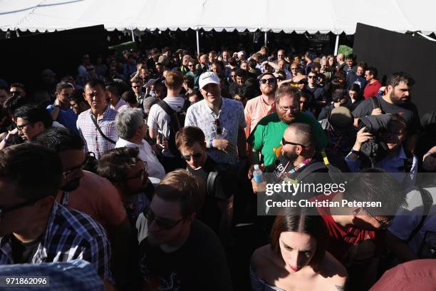 Fans await to enter the Sony Playstation E3 conference at LA Center Studios on June 11, 2018 in Los Angeles, California. The E3 Game Conference...